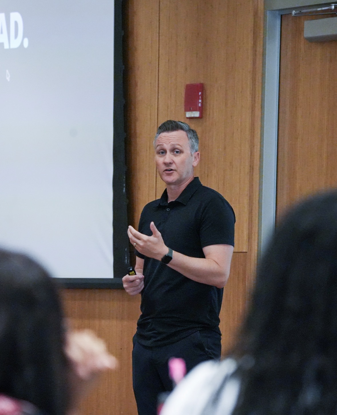 Kevin DeShazo speaking with a smaller group in a workshop
